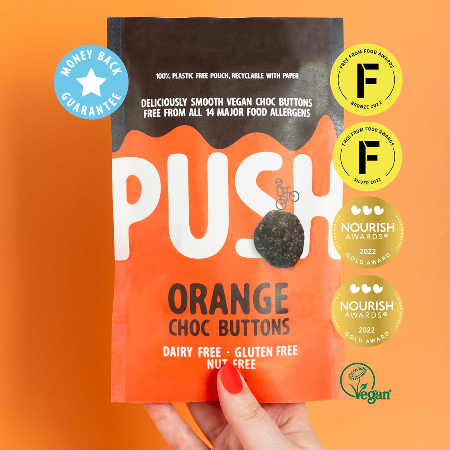 Push orange dairy free chocolate buttons pouch with money back guarantee stickers. 